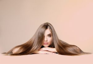 Woman with glossy hair.