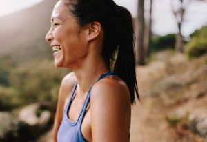 Smiling woman outdoors.