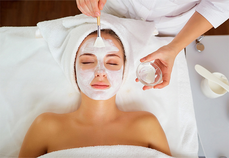 Woman having a facial.