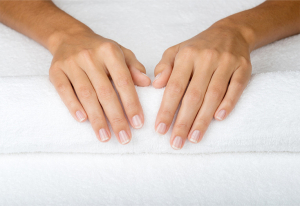 Hands with healthy nails.