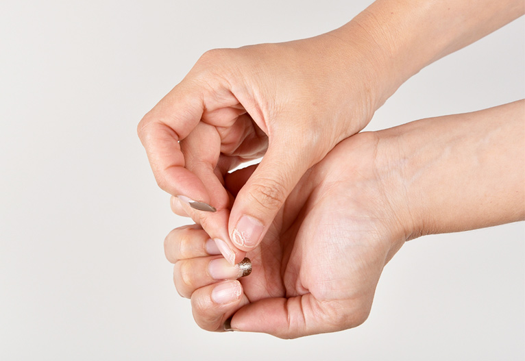 Person with broken nails.
