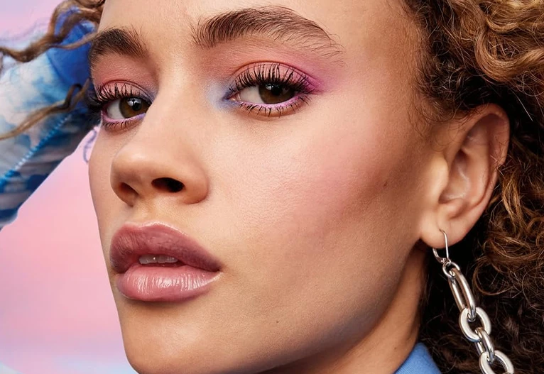 Model wearing Maybelline Sky High Waterproof Mascara.