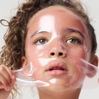 Young girl wearing a Rini face mask.