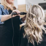 Woman having her hair styled at the salon.