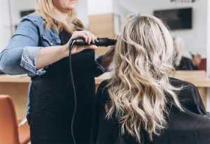 Woman having her hair styled at the salon.