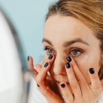 Clinical-grade skincare cream beside online shopping packaging illustrating the risks of buying skincare from unauthorised online sellers.