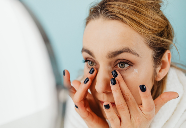 Clinical-grade skincare cream beside online shopping packaging illustrating the risks of buying skincare from unauthorised online sellers.