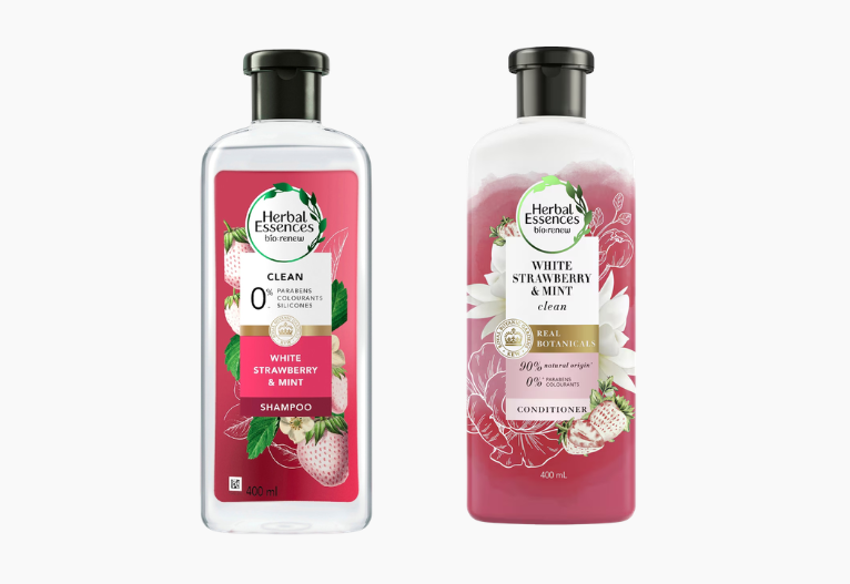 Herbal Essences shampoo and conditioner bottles.