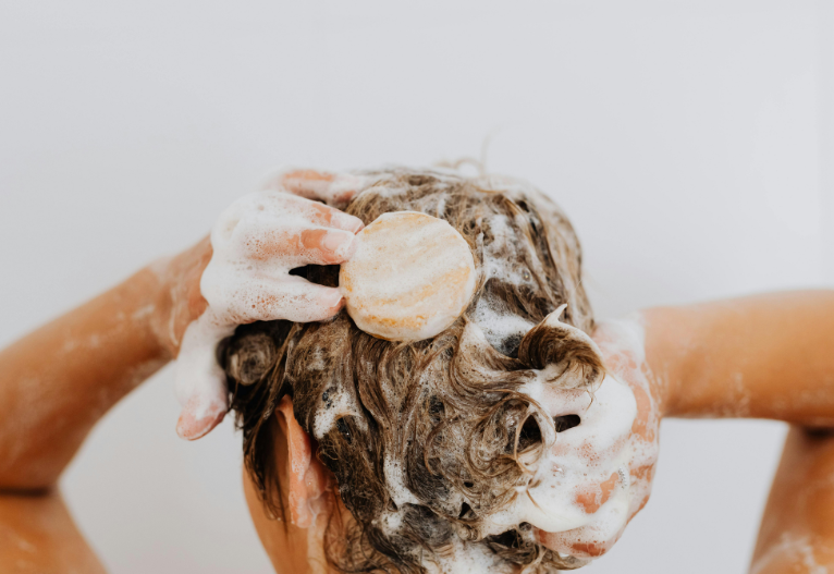 Woman washing her hair.